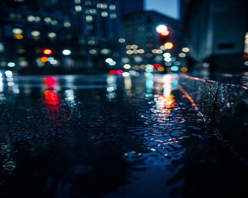 A blurred background of city lights at night